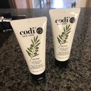 Bundle of two unopened olive oil lotion